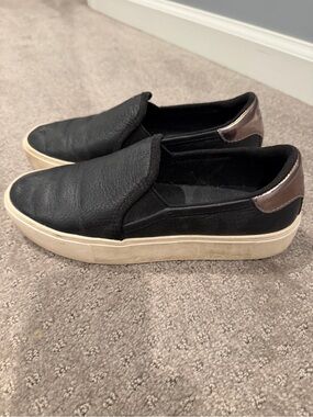 UGG women's Black Slip-On Casual Sneakers with Metallic Heel Accent